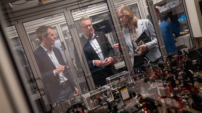 Kickoff of QCI.DK with visit in DTU's laboratory for quantum technology. From left: Professor Ulrik Lund Andersen, DTUPhysics, Morten Bødskov, Minister for Industry, Business and Financial Affairs and Head of Department Jane Hvolbæk Nielsen, DTU Physics
